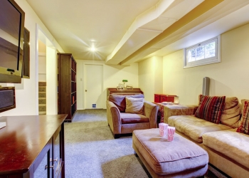 26301218 - carpet floor living room with sofa and chair. furnished with bookshelf, cabinet and tv