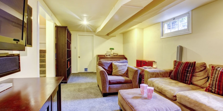 26301218 - carpet floor living room with sofa and chair. furnished with bookshelf, cabinet and tv