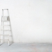 20413371 - ladder on concrete wall, construction site.